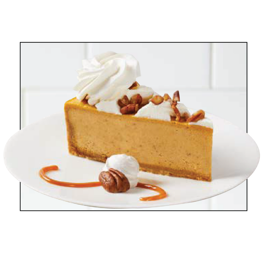 Slice of pumpkin cheesecake with pecans