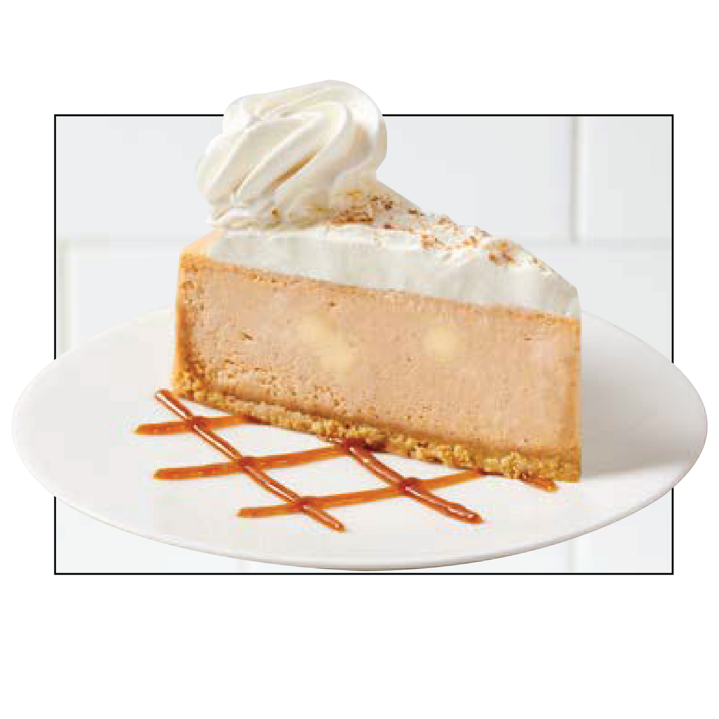 Slice of cheesecake with whipped cream and caramel drizzle
