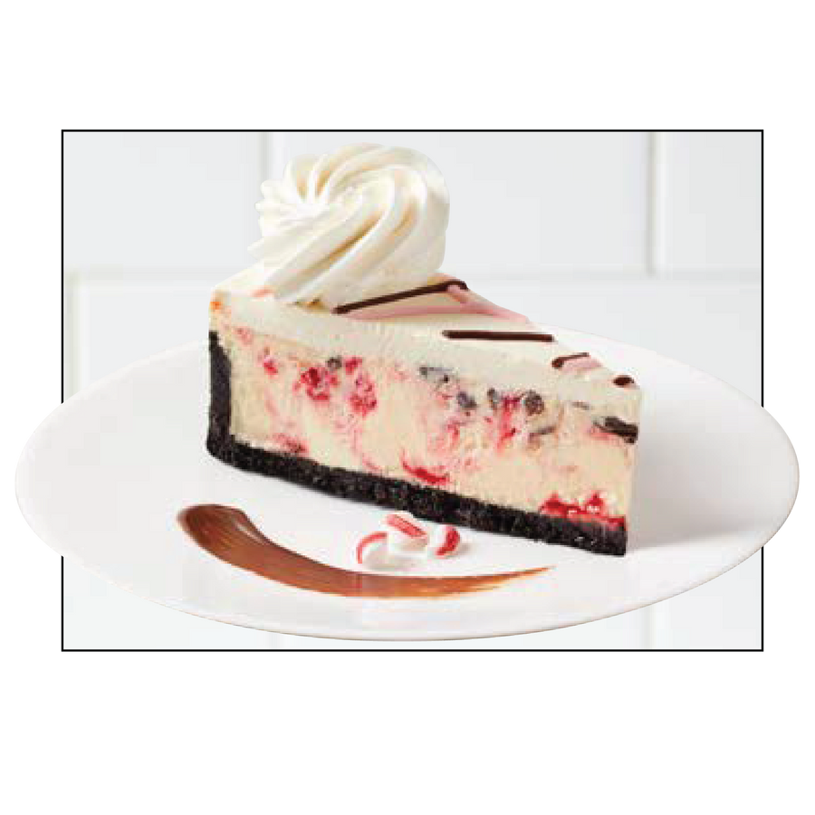 Slice of cheesecake with swirl of whipped cream - cake16-01